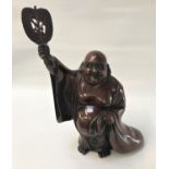 19TH CENTURY BRONZE FIGURE OF HOTEI wearing a loose open robe, with a smiling expression and one arm