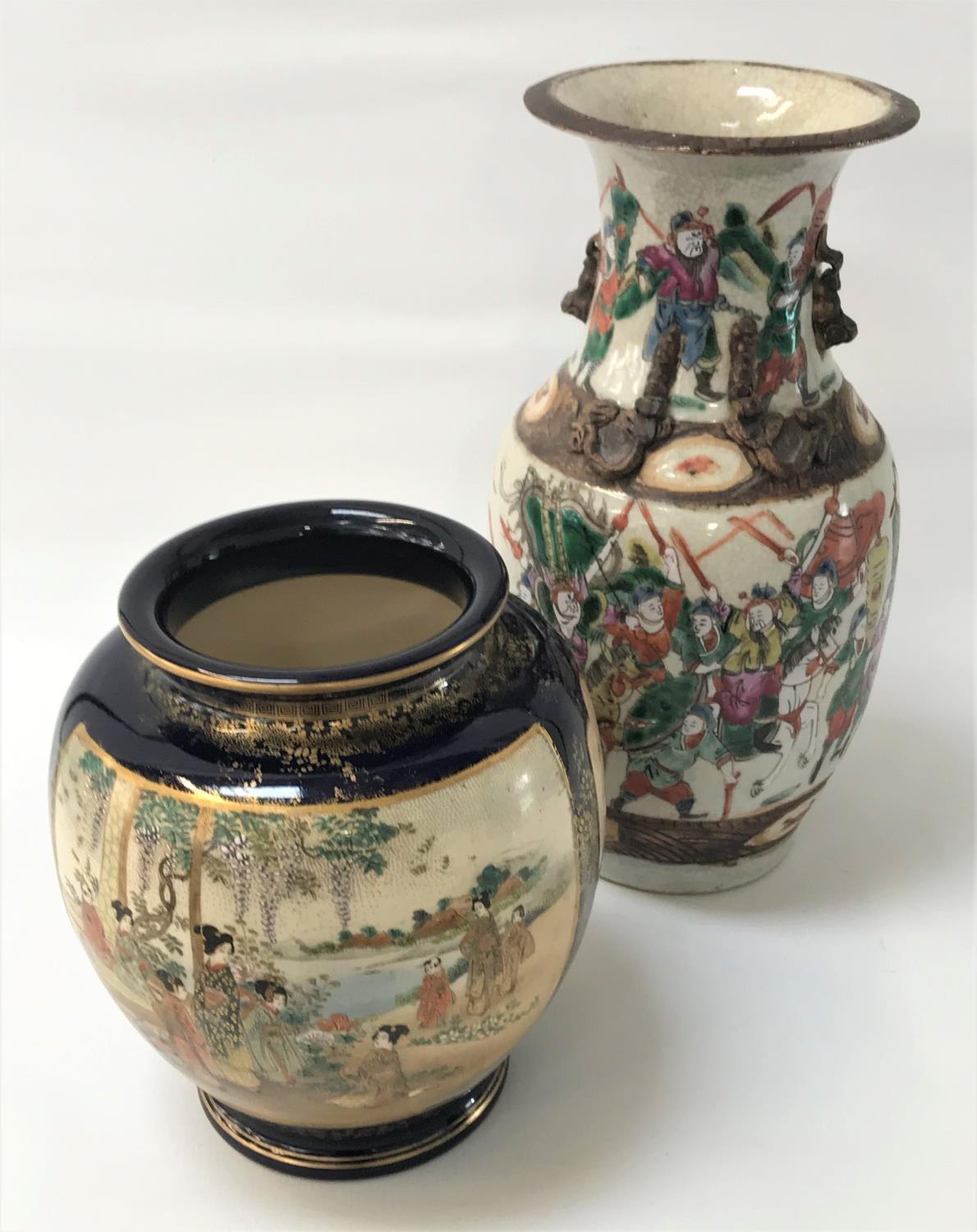 EARLY 20th CENTURY JAPANESE SATSUMA VASE the panels with Geisha in landscape settings on a blue