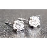 MATCHED PAIR OF DIAMOND STUD EARRINGS the diamonds totalling approximately 0.35cts, in nine carat