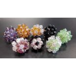 EIGHT COSTUME JEWELLERY DRESS RINGS of various colours