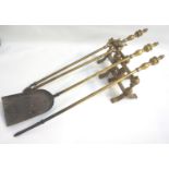 EARLY 20TH CENTURY BRASS FIRE TOOLS comprising a shovel, pair of tongs, poker and two andirons