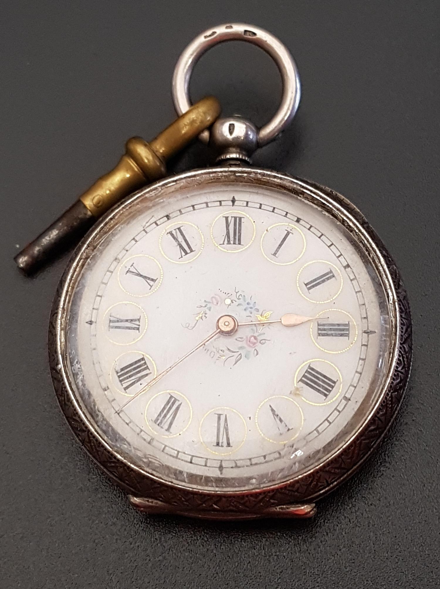 CONTINENTAL SILVER CASED FOB WATCH the white dial with Roman numerals and floral and gilt