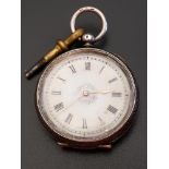 CONTINENTAL SILVER CASED FOB WATCH the white dial with Roman numerals and floral and gilt