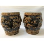PAIR OF CHINESE GARDEN SEATS of barrell form in brown glaze with lion mask side handles and