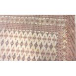 LARGE MODERN ISHFAN RUG with a mushroom ground with motifs encased by a multi banded border,