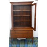 OAK BOOKCASE ON CHEST with a moulded top above a pair of glazed doors opening to reveal adjustable