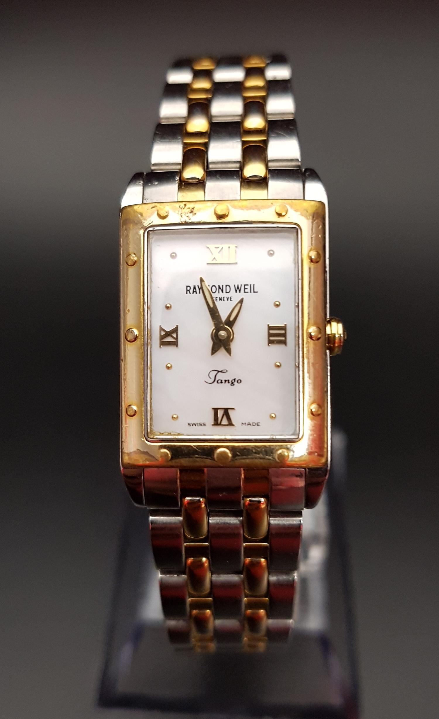 LADIES RAYMOND WEIL TANGO COLLECTION WRISTWATCH the mother of pearl dial with Roman numerals at