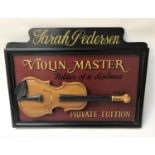 REPRODUCTION VIOLIN TEACHERS SIGN in wood with a raised violin and bearing the legend 'Sarah
