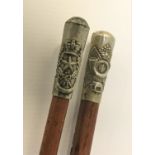 TWO MILITARY SWAGGER STICKS one finial with 6th/7th Battalion The Cameronians (Scottish Rifles)