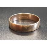 NINE CARAT GOLD WEDDING BAND ring size V and approximately 2.7 grams