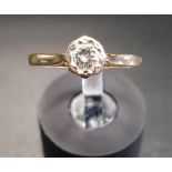 DIAMOND SOLITAIRE RING the round brilliant cut diamond approximately 0.22cts, on eighteen carat gold
