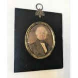 WATERCOLOUR MINIATURE PORTRAIT OF A GENTLEMAN the oval portrait in rectangular frame, miniature size