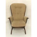 ERCOL OAK ARMCHAIR with a shaped stickback and arms with a loose button back cushion and seat,