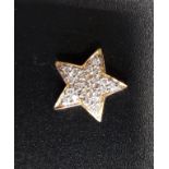 DIAMOND SET STAR SHAPED PENDANT the pave set diamonds in fourteen carat gold