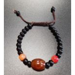 ONYX, AGATE AND CARNELIAN BEAD BRACELET with slider clasp