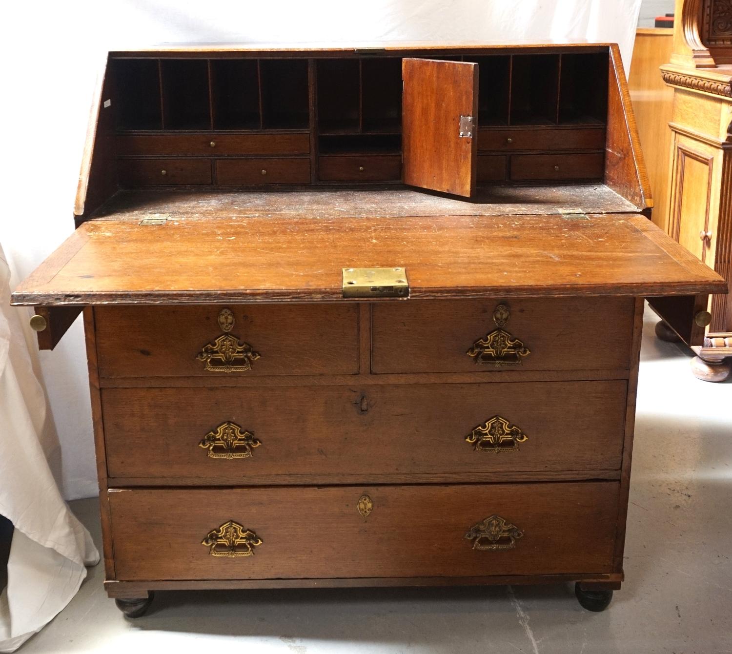 LATE 18th CENTURY OAK BUREAU with a fall flap revealing a fitted interior of drawers and pigeon - Image 2 of 2