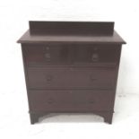 EDWARDIAN MAHOGANY DRESSING CHEST with a raised back above two short and two long drawers,