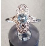 ART DECO STYLE AQUAMARINE AND DIAMOND PLAQUE RING the central round cut aquamarine in multi