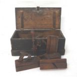 VINTAGE STAINED PINE CHEST with lift up lid revealing a selection of vintage carpenter's tools