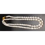 LONG CULTURED PEARL NECKLACE with magnetic clasp, approximately 87cm long