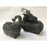 TWO INDIAN BEETLE NUT BOXES in white metal, one depicting a recumbent deer, 17cm long; the other