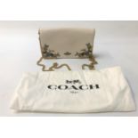 COACH EVENING BAG the cream bag with floral metal decoration, metal chain shoulder strap and