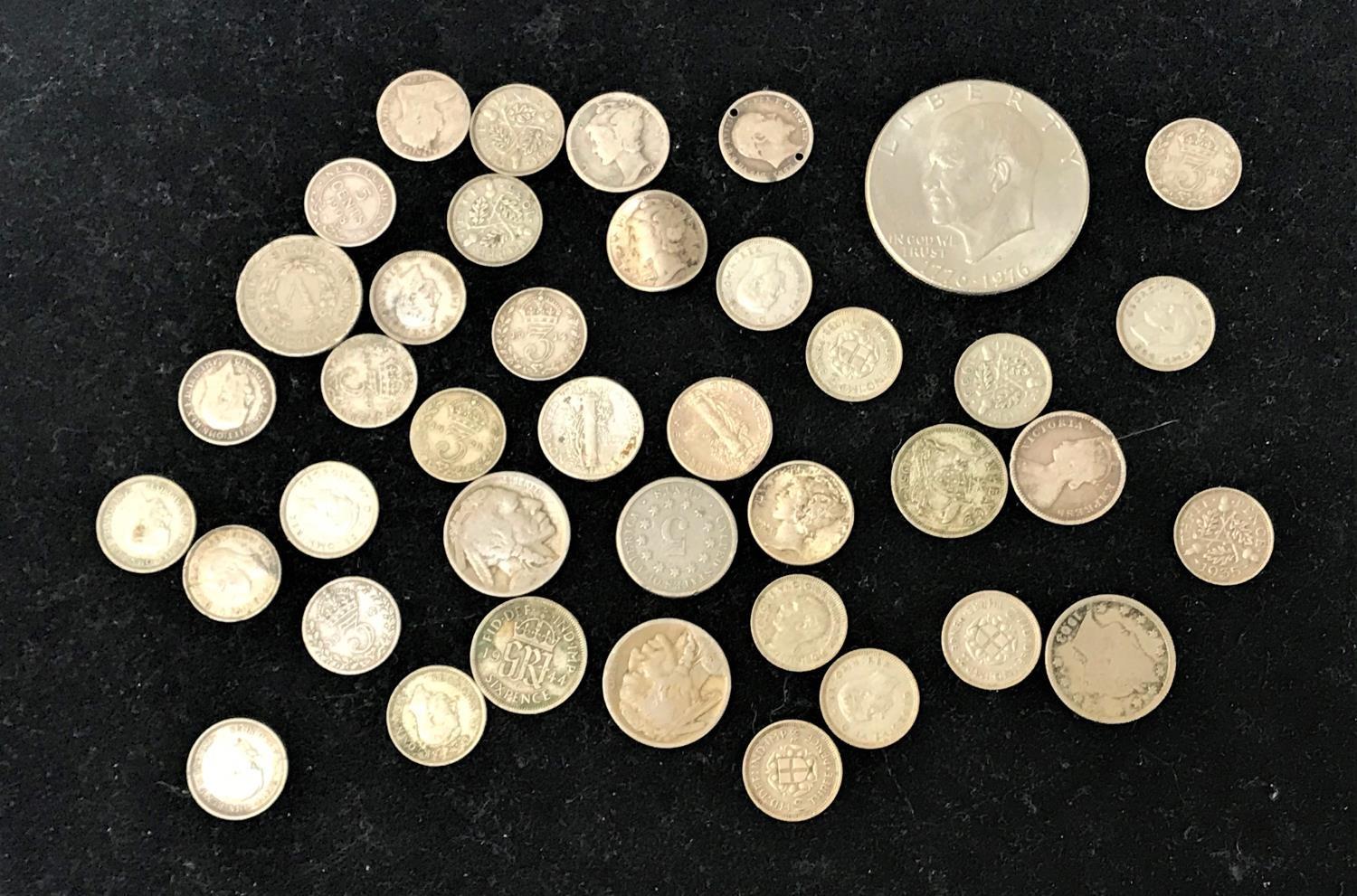 SELECTION OF BRITISH SILVER AND WORLD COINS including .925 and .500 silver, a Victorian three pence,