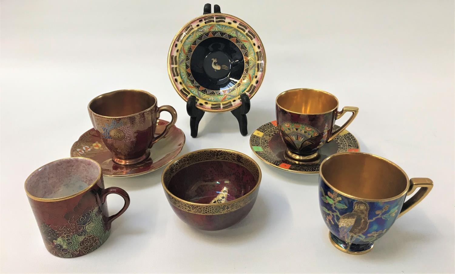 SELECTION OF CARLTON WARE CUPS AND SAUCERS comprising a 'Babylon' pattern cup and saucer on a red