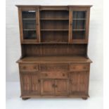 ERCOL OAK DRESSER the upper inverted breakfront section with three central shelves flanked by a pair