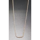 FOURTEEN CARAT GOLD ROPE TWIST NECK CHAIN 51.5cm long and approximately 9.9 grams