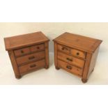 PAIR OF PINE BEDSIDE CHESTS with plank tops above three drawers, standing on bun feet, 70cm high (2)