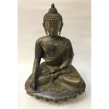 19TH CENTURY BRONZE BUDDHA SHAKYAMUNI seated with legs crossed with one hand across his lap with the