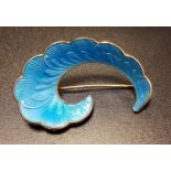 NORWEGIAN SILVER AND BLUE ENAMEL DECORATED BROOCH of wave design, by Ivar T. Holth
