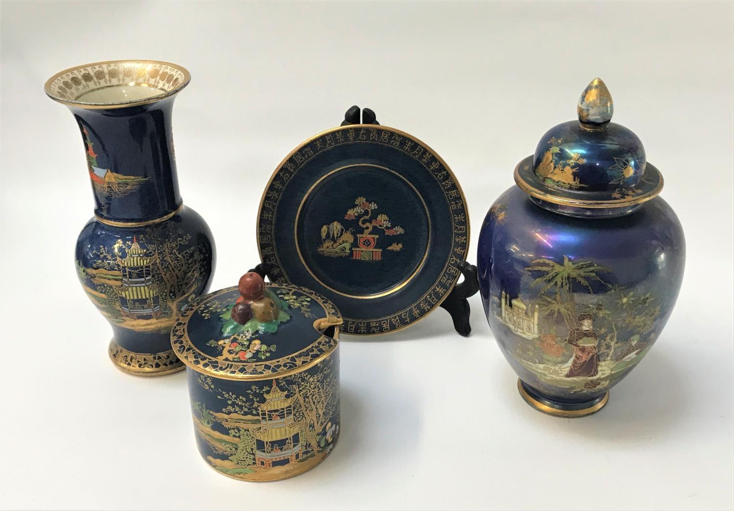 SELECTION OF CARLTON WARE all circa 1930s and on blue grounds, comprising a 'Persian' pattern jar