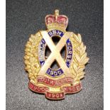 SCOTTISH HORSE LAPEL BADGE in gilt metal and enamel, 'South Africa 1900, 1901 and 1902', 3.5cm high