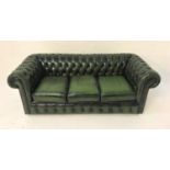 CHESTERFIELD THREE SEAT SOFA in green leather with button back and arms with decorative stud detail,