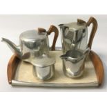 PICQUOT WARE STAINLESS STEEL TEA SET comprising a tea pot, hot water jug, lidded sugar bowl, milk