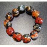 ATTRACTIVE AGATE BEAD BRACELET comprising of twelve beads in green, white and orange