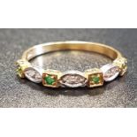 EMERALD AND DIAMOND HALF ETERNITY RING the alternating single emeralds in square settings and double