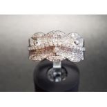 MULTI PAVE SET DIAMOND DRESS RING the diamonds in wavy and shaped setting, in nine carat white gold,