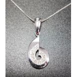 DIAMOND SET SPIRAL DESIGN PENDANT in nine carat white gold and on nine carat white gold chain