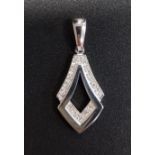 DIAMOND SET NINE CARAT WHITE GOLD PENDANT of shaped design with pierced centre