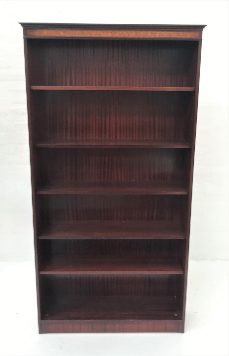 STAINED MAHOGANY OPEN BOOKCASE with a moulded inlaid top above five adjustable shelves, standing