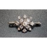 EDWARDIAN DIAMOND SET BROOCH the old cut diamonds in floral setting totalling approximately 0.
