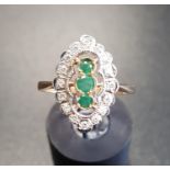 ART DECO STYLE EMERALD AND DIAMOND CLUSTER DRESS RING the three vertically set emeralds in navette