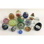 SELECTION OF FIFTEEN PAPERWEIGHTS including an Ekenas Swedish clear glass paperweight, a Caithness