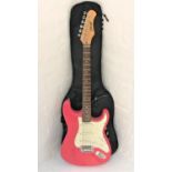 STAGG ELECTRIC GUITAR with a candy pink body with three dials, the body signed Alan Cranney 08, with