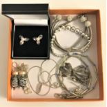 SELECTION OF SILVER JEWELLERY including four bracelets of various designs, a silver necklace with