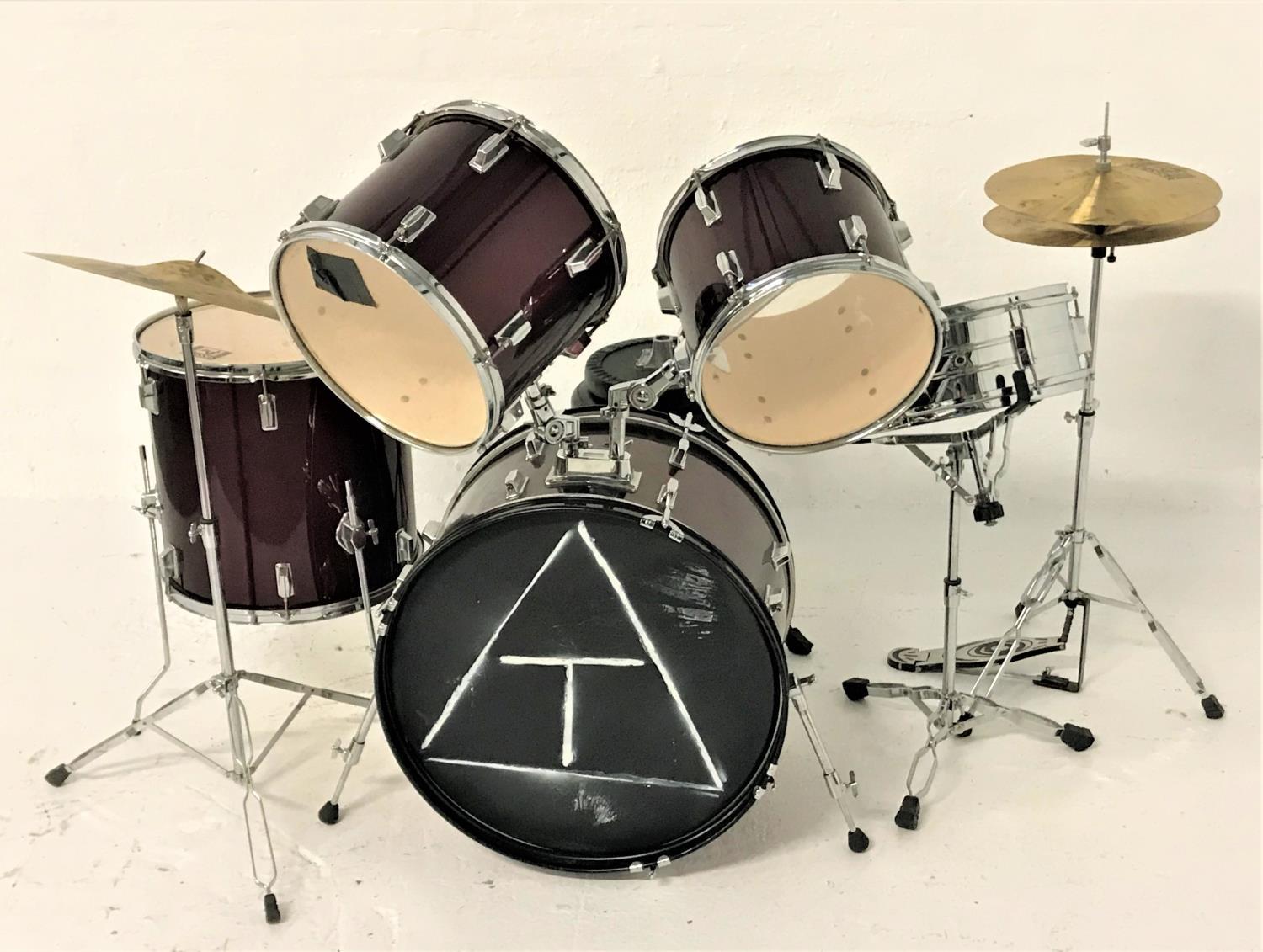 SESSION PRO DRUM KIT comprising four drums with deep red coloured bodies, snare drum, two cymbals