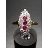 ART DECO STYLE RUBY AND DIAMOND PLAQUE RING the three vertically set rubies in twelve diamond